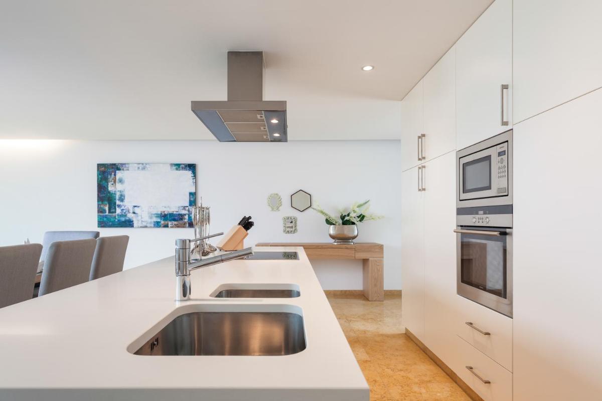 A cozinha ou kitchenette de Pine Cliffs Village