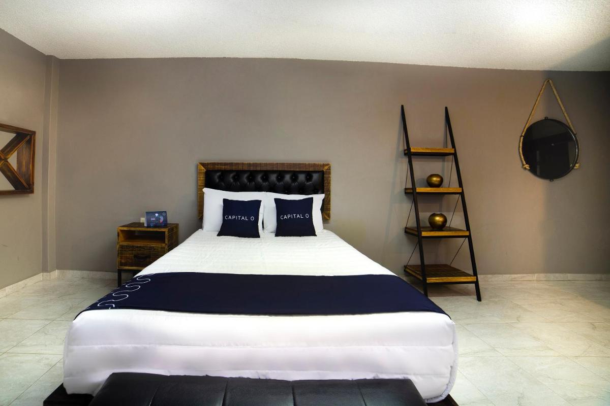 Capital O Hotel Diez - Housity