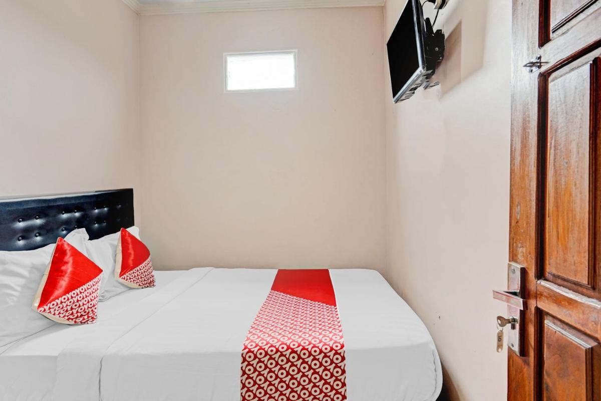 OYO 90234 Dhoho Family Guest House - Hizvo