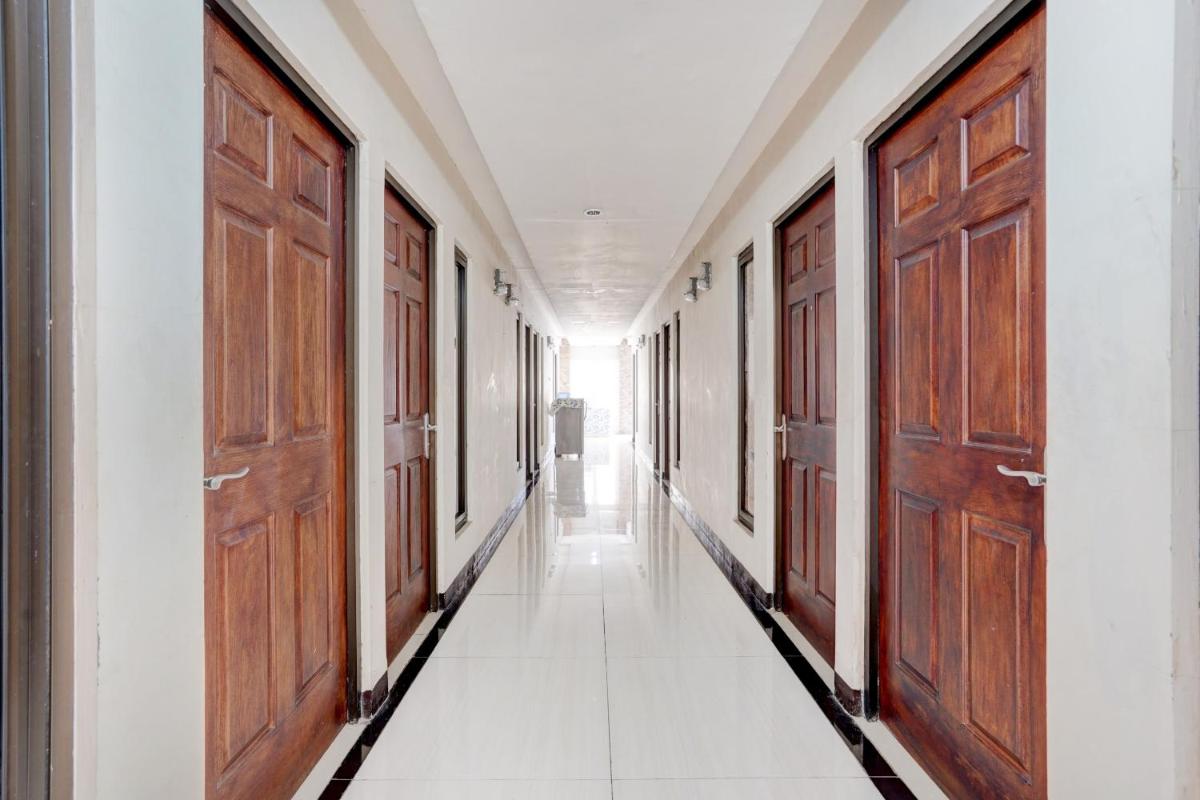 SUPER OYO 90606 Glass House Citraland Syariah - Housity