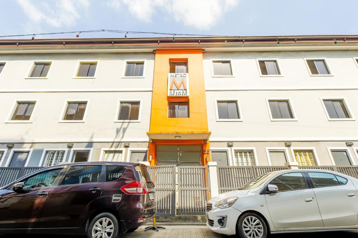 Super OYO 841 Metro Deluxe Residences - Housity