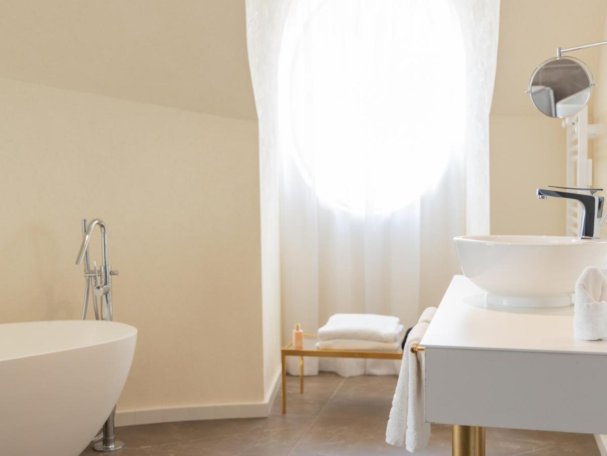 Salle de bains dans l'établissement Boscolo Lyon Hotel & Spa