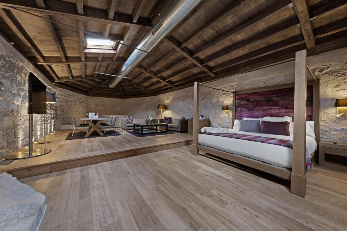 Cama o camas de una habitación en Castilla Termal Monasterio de Valbuena