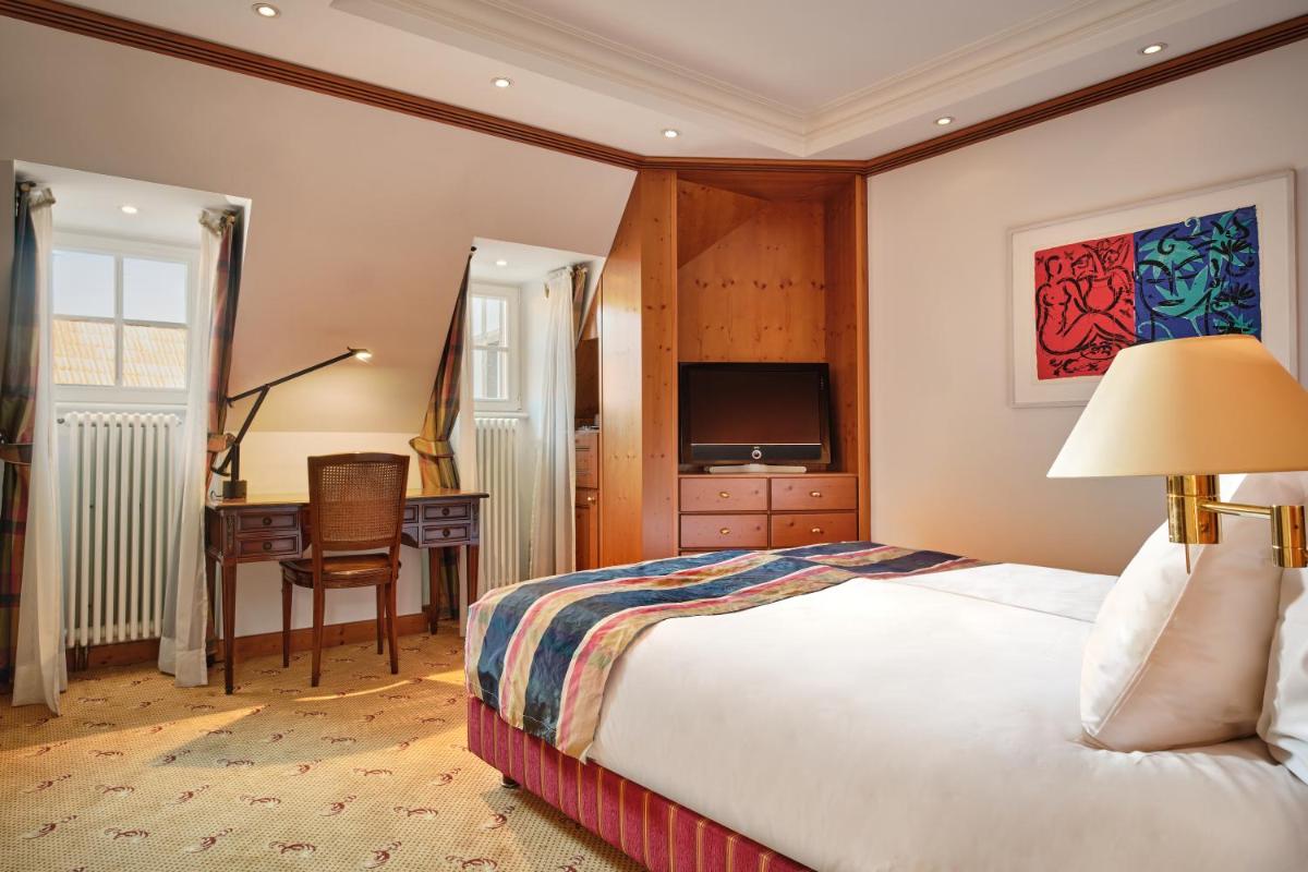 Un ou plusieurs lits dans un hébergement de l'établissement Hotel & Spa A la cour d'Alsace by HappyCulture