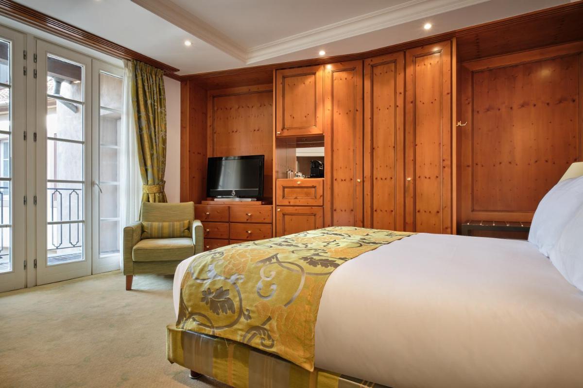 Un ou plusieurs lits dans un hébergement de l'établissement Hotel & Spa A la cour d'Alsace by HappyCulture