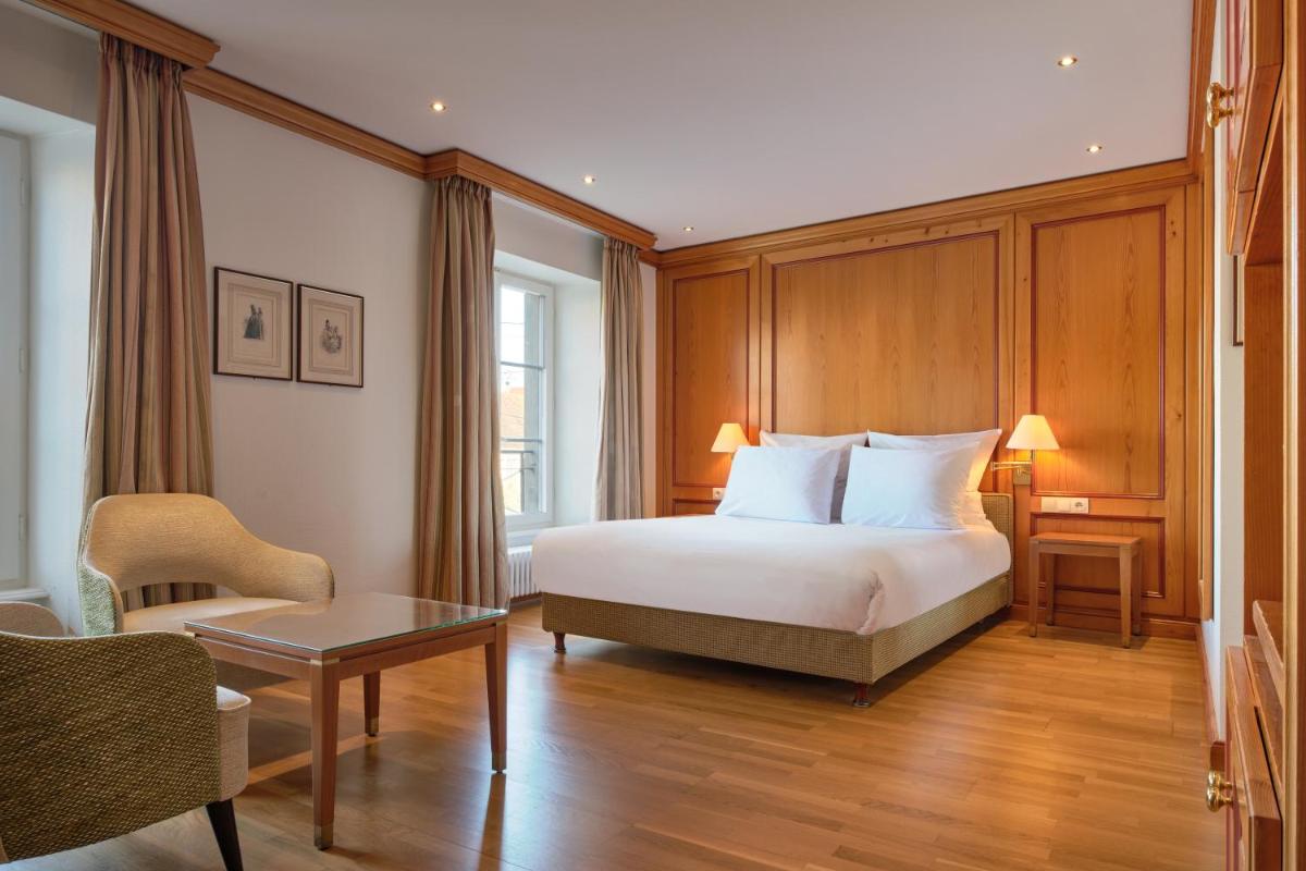 Un ou plusieurs lits dans un hébergement de l'établissement Hotel & Spa A la cour d'Alsace by HappyCulture