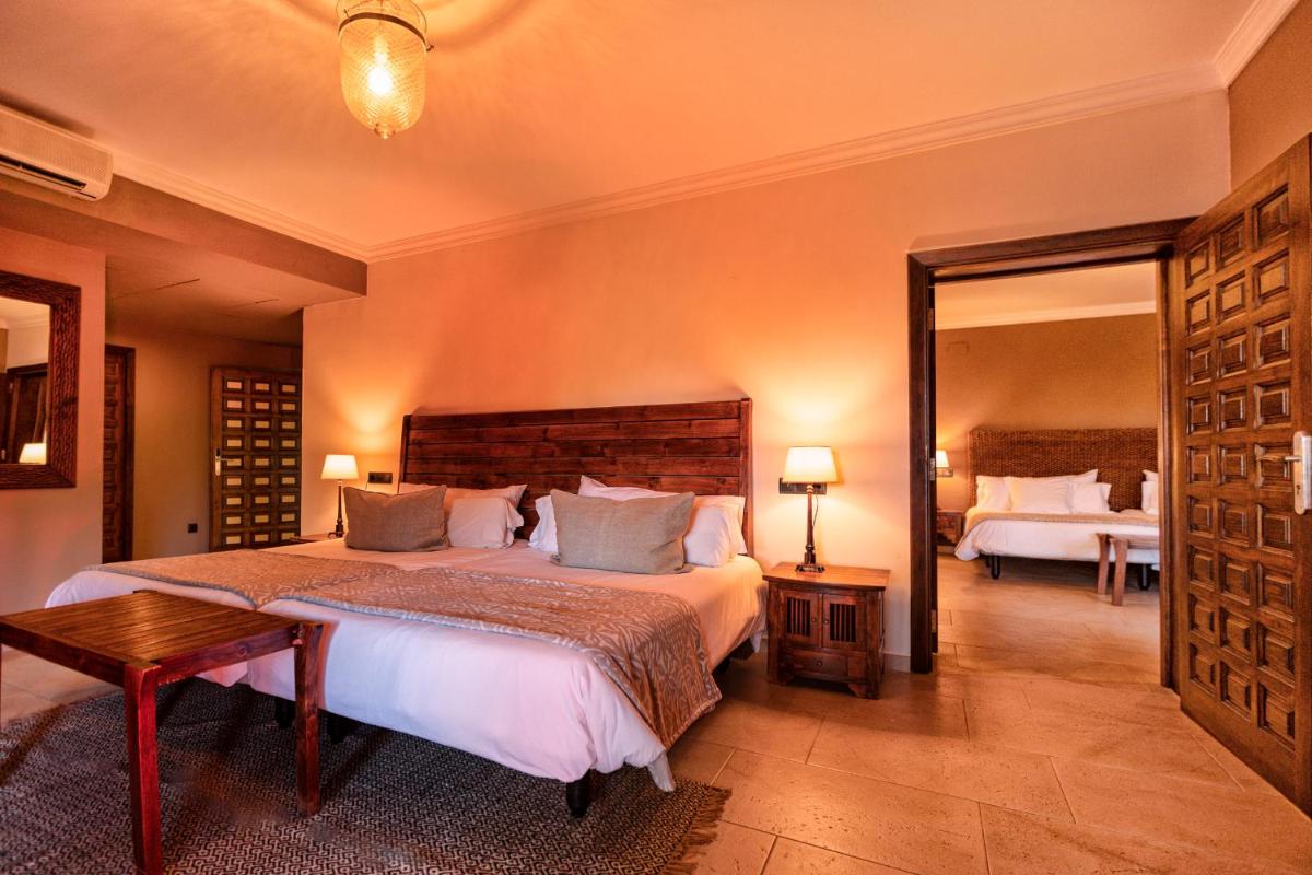 Cama o camas de una habitación en SWISS MORAIRA HOTEL & SPA - Adults only