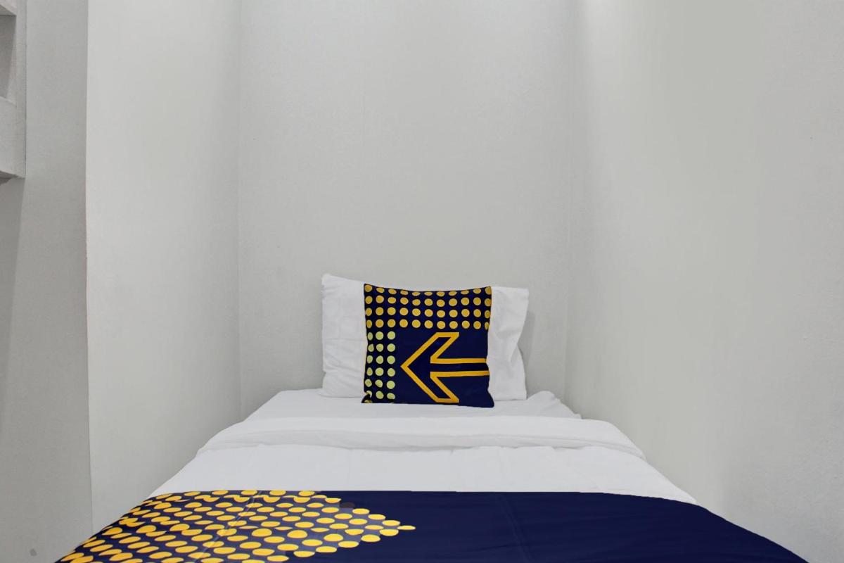 OYO Life 92509 Maulana Guest House Simpur - Housity