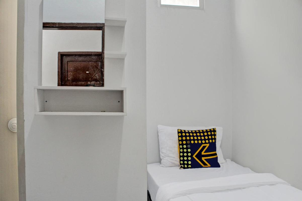 OYO Life 92509 Maulana Guest House Simpur - Housity