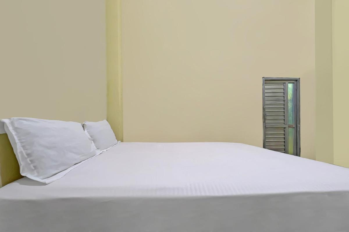 SPOT ON 92547 Wisma Dg Tata - Housity