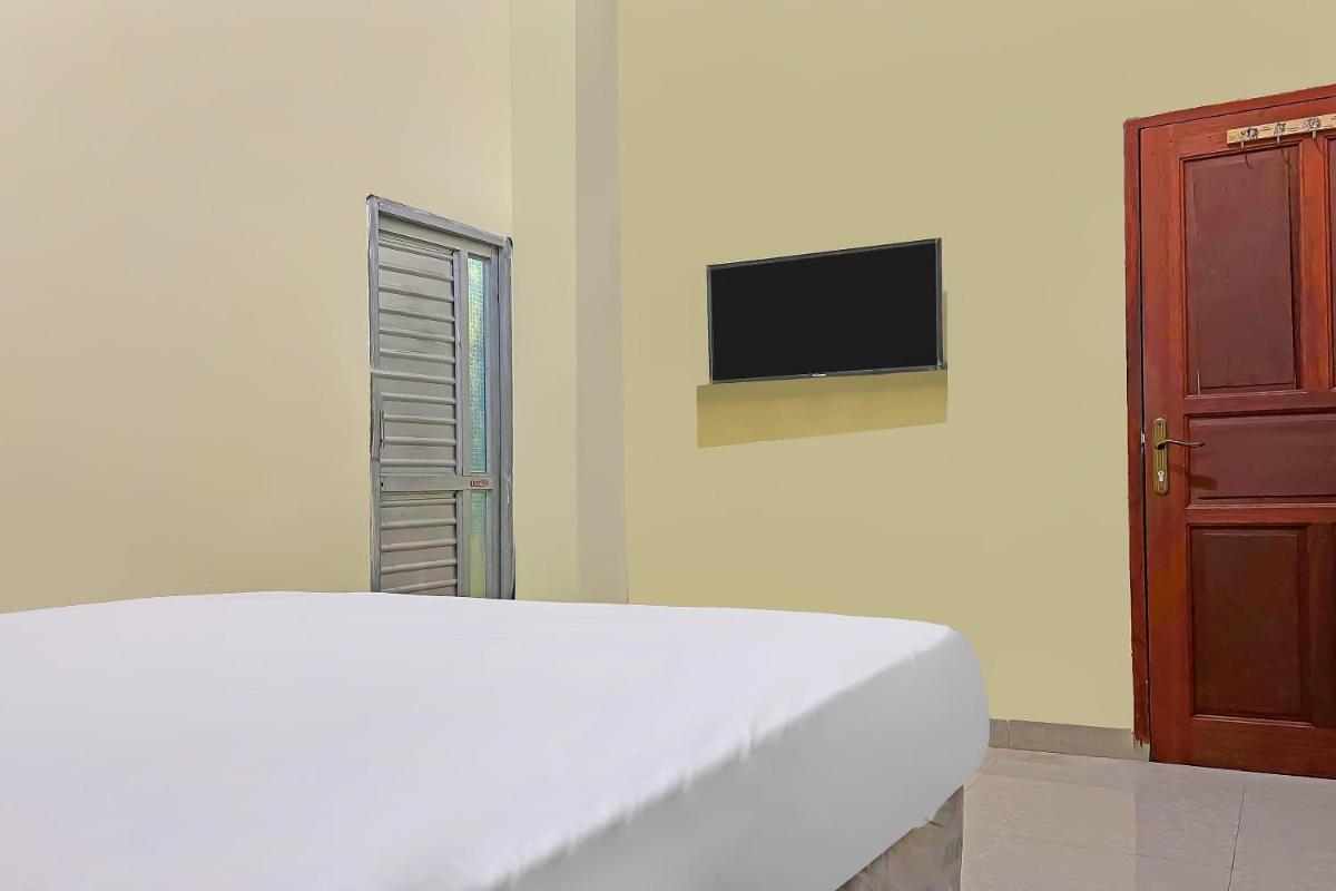 SPOT ON 92547 Wisma Dg Tata - Housity