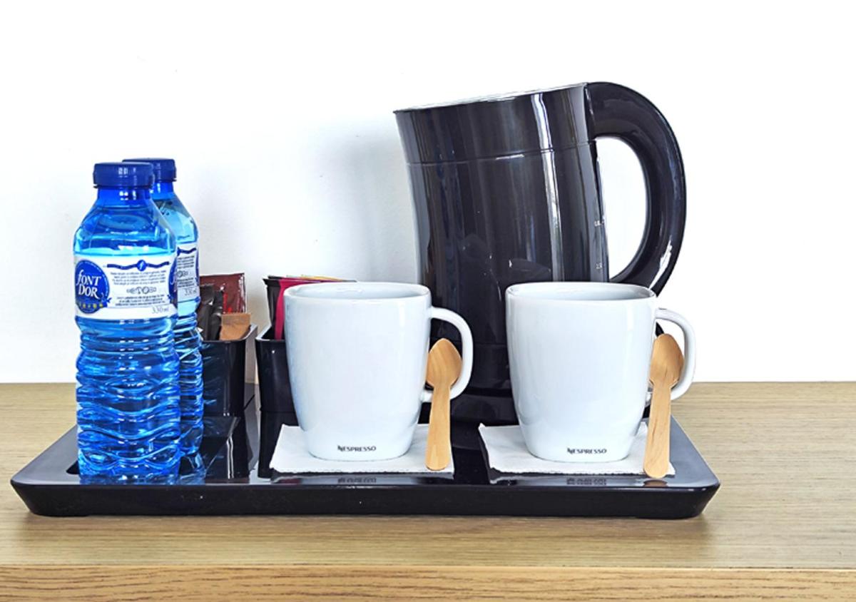 Utensilios para hacer té y café en AQUA Hotel Onabrava & Spa 4*Sup