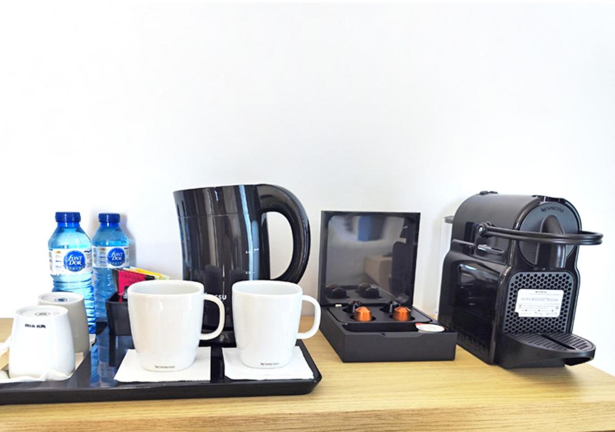 Utensilios para hacer té y café en AQUA Hotel Onabrava & Spa 4*Sup