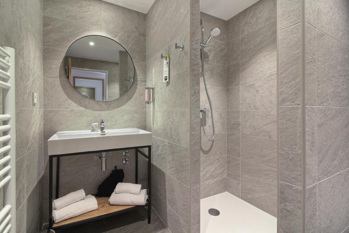Salle de bains dans l'établissement Pure Montagne Resort & Spa