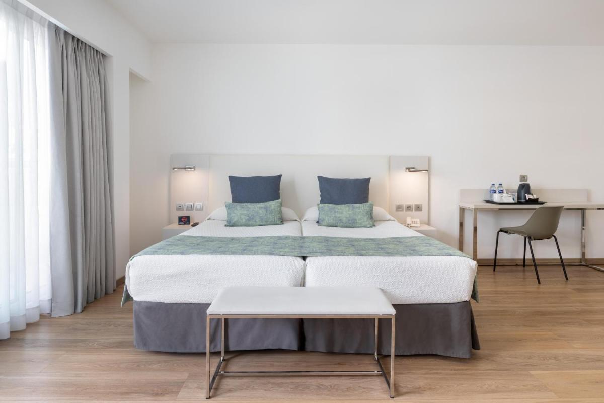 Cama o camas de una habitación en Alexandre Troya