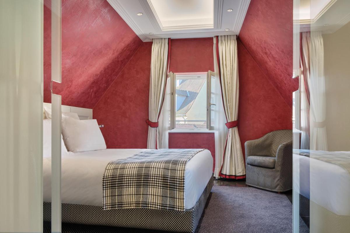 Un ou plusieurs lits dans un hébergement de l'établissement Hotel & Spa A la cour d'Alsace by HappyCulture