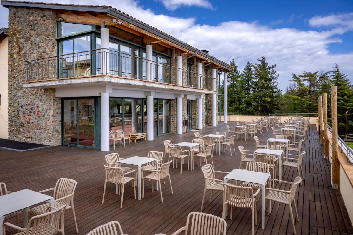Un balcón o terraza de Vilar Rural De Sant Hilari Sacalm by Serhs Hotels