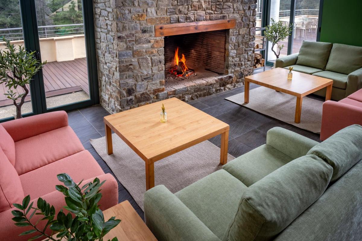 Zona de estar de Vilar Rural De Sant Hilari Sacalm by Serhs Hotels