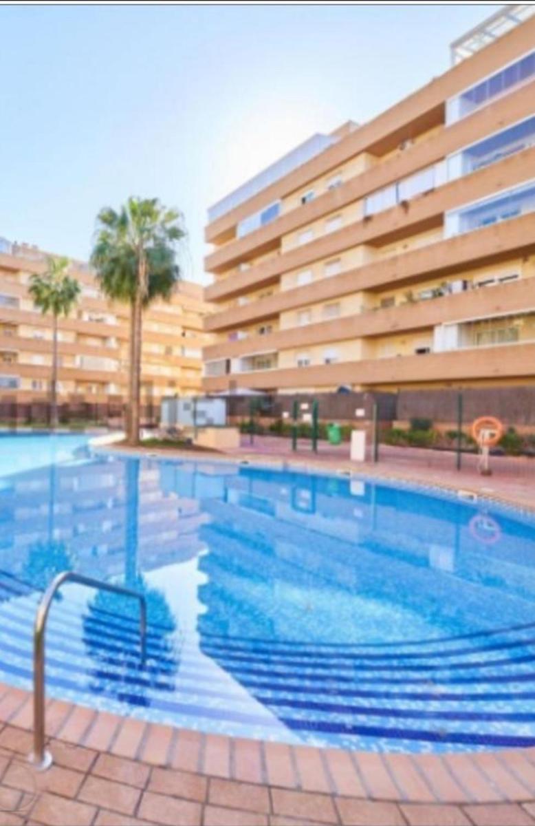 Ático junto al Teatro Auditorio de Roquetas, con Piscina, Parking y Terraza - Housity