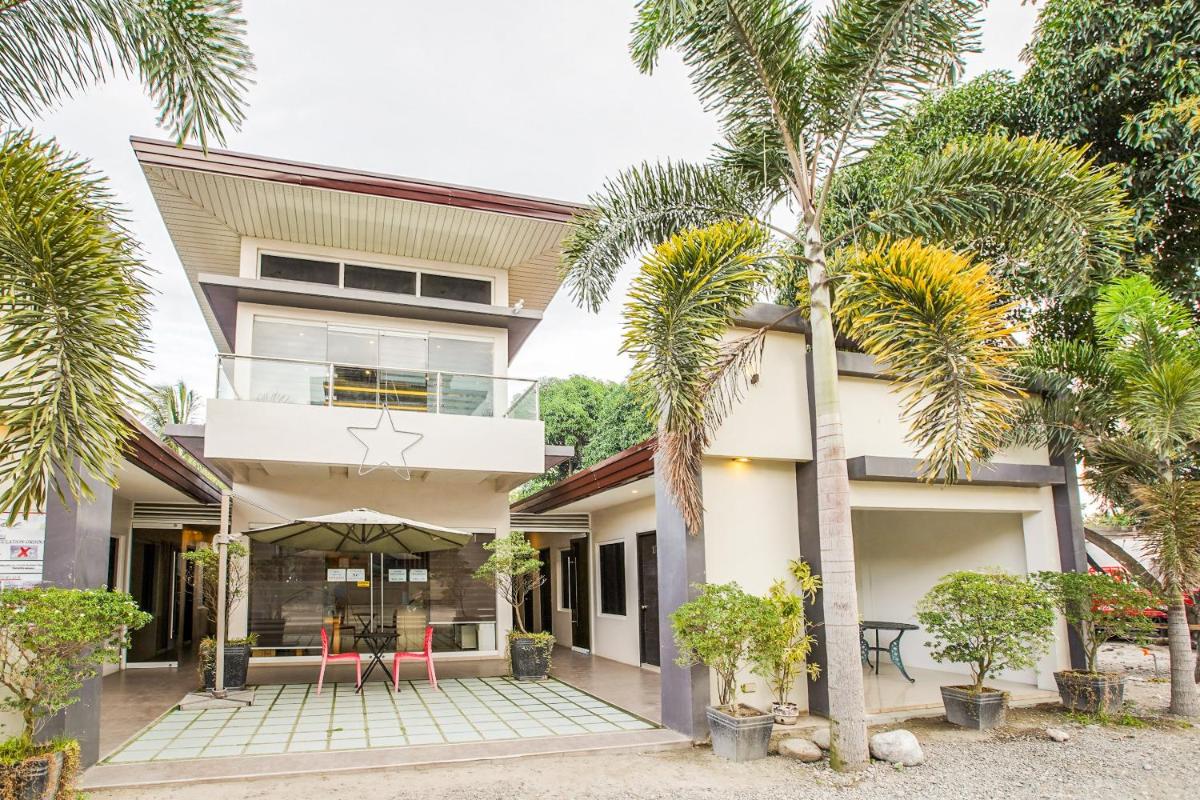 OYO 489 Casa Mia Hotel Suites - Housity