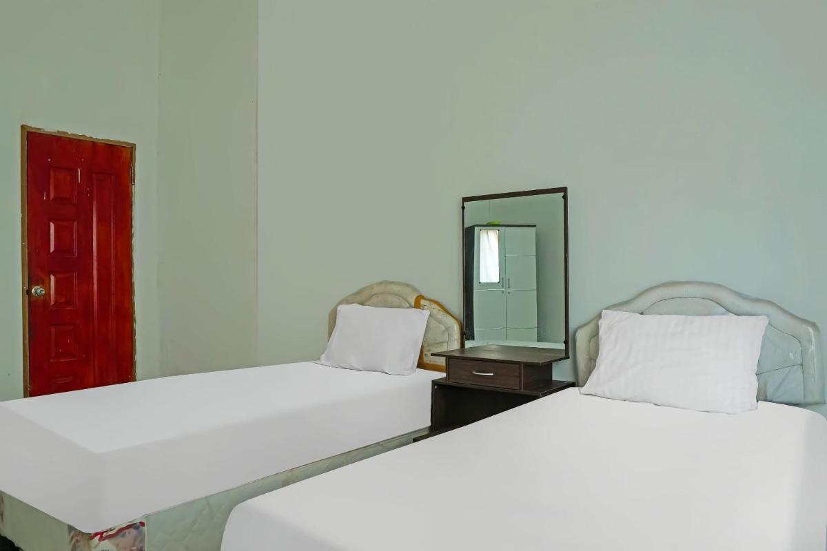 Hotel O Wilma Kost Syariah - Housity