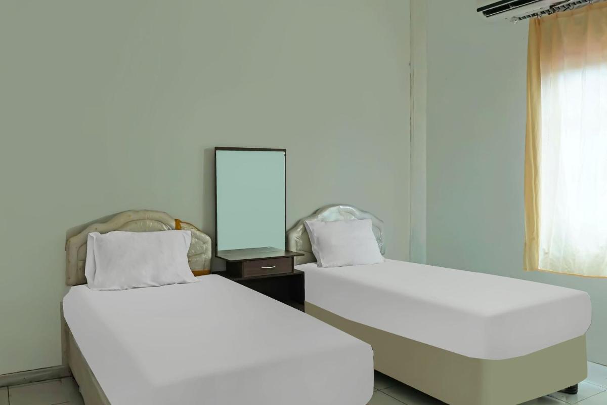 Hotel O Wilma Kost Syariah - Housity