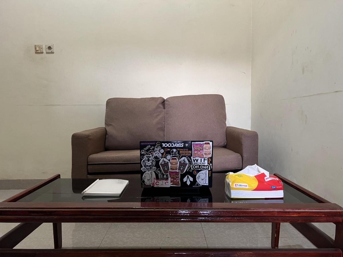 Hotel O Losmen Arkansas Syariah - Housity