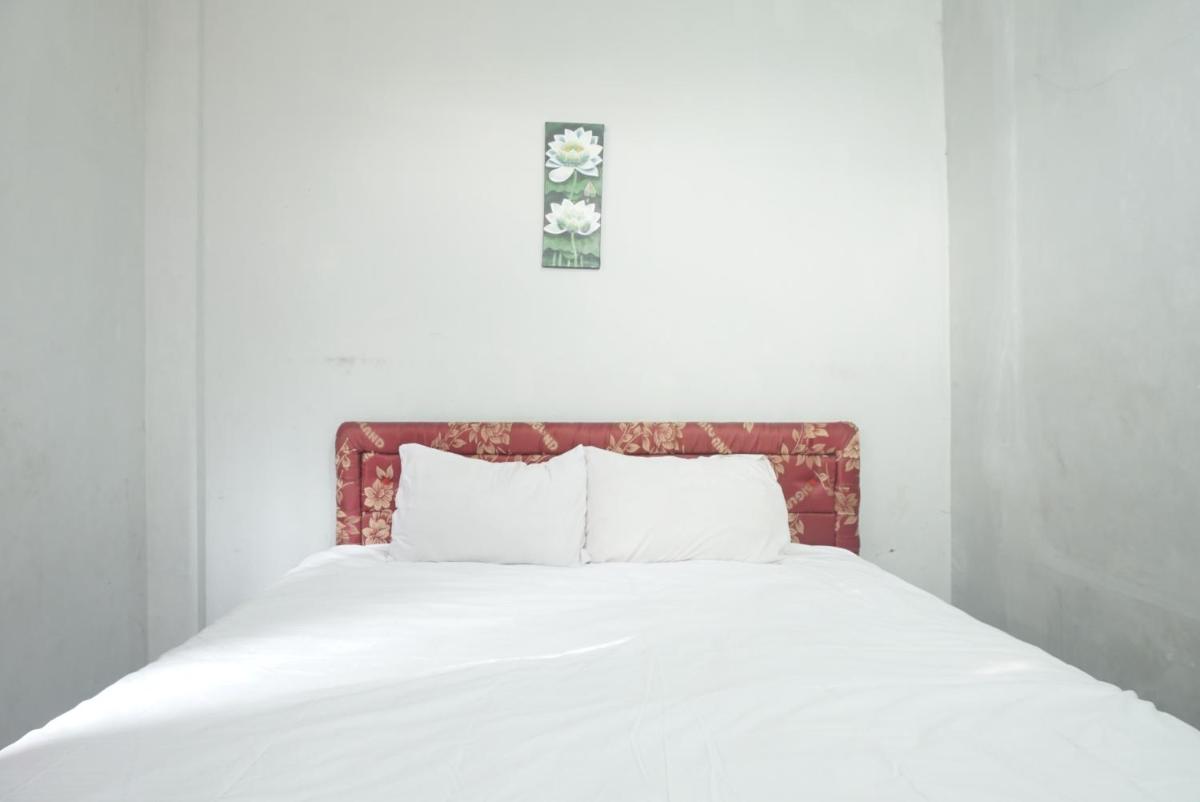 Hotel O Losmen Arkansas Syariah - Housity
