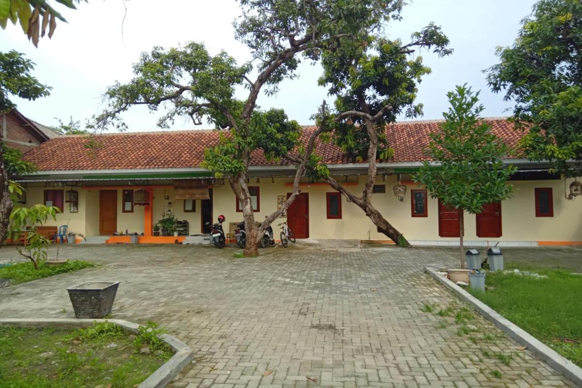 SPOT ON 93452 Wulan Homestay 2 Syariah - Housity