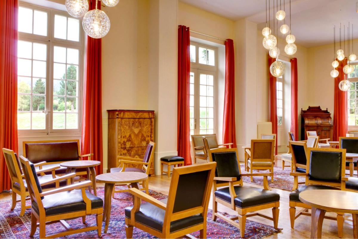 Coin salon dans l'établissement Best Western Grand Hotel de Paris & Spa