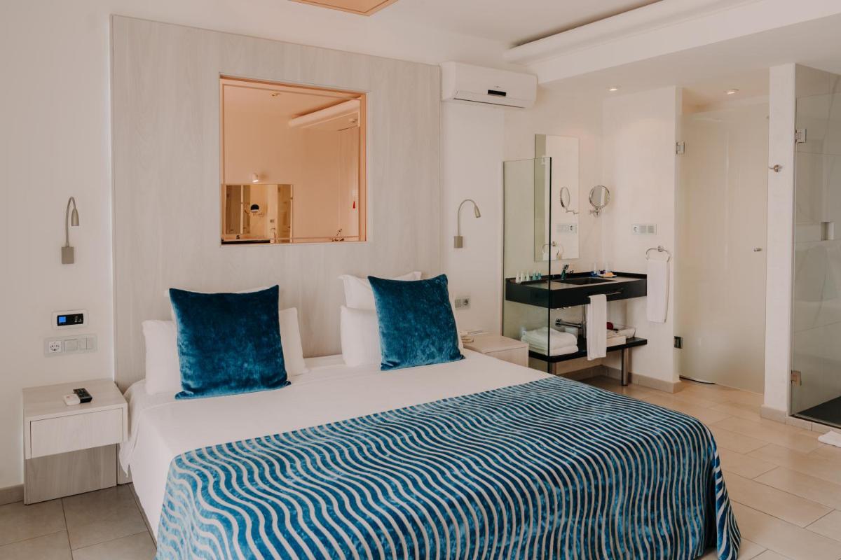 Cama o camas de una habitación en Hotel Vistabella