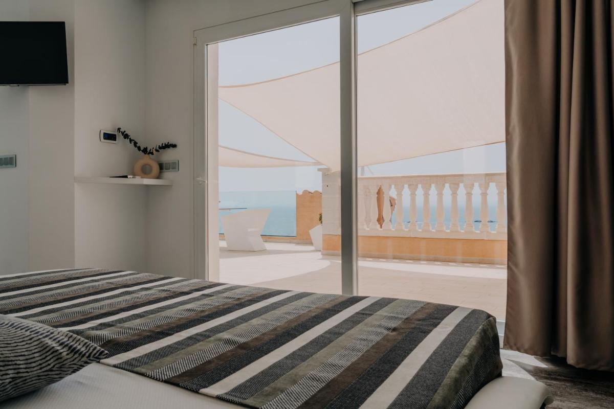 Cama o camas de una habitación en Hotel Vistabella