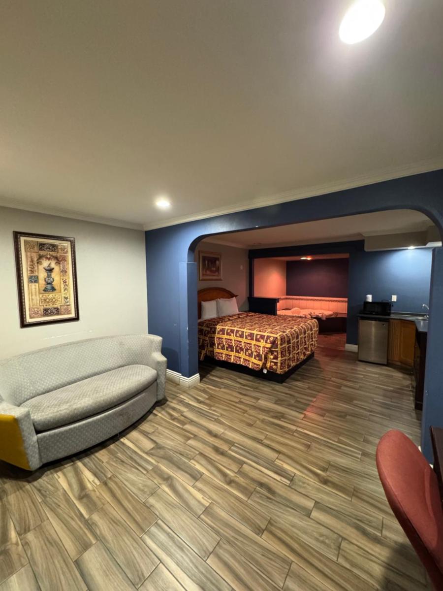 Sunset Inn & Suites - Housity