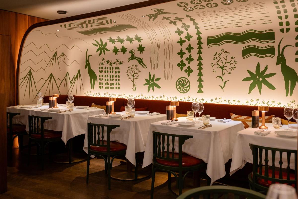 Restaurant ou autre lieu de restauration dans l'établissement Coeur de Megève