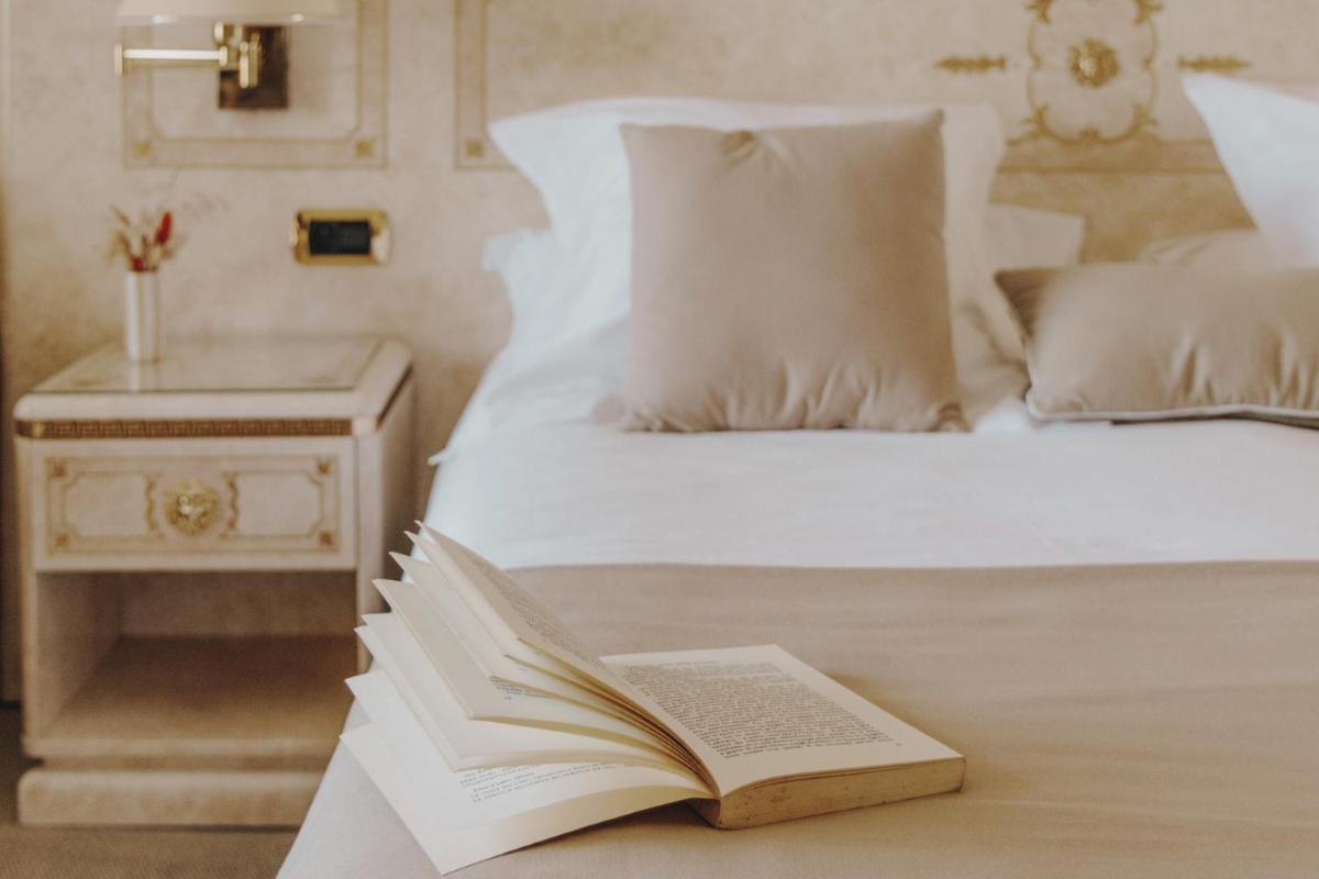 Un ou plusieurs lits dans un hébergement de l'établissement Hotel Corsica & Spa Serena