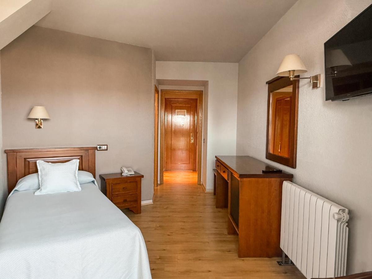 Cama o camas de una habitación en Puigcerda Park Hotel