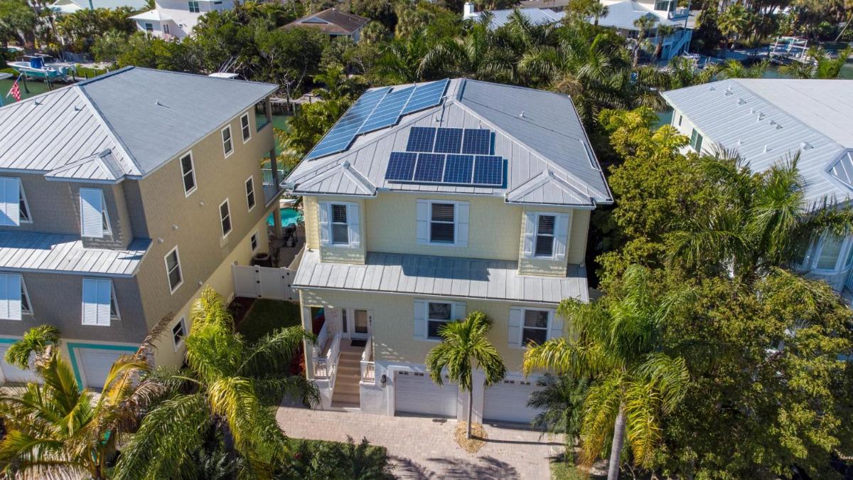 Luxury Waterfront Home With A Heated Pool And Spa! - Housity