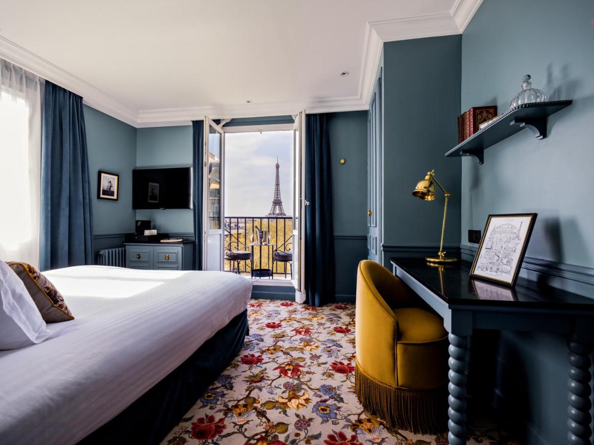 Un ou plusieurs lits dans un hébergement de l'établissement Hotel Duquesne Eiffel