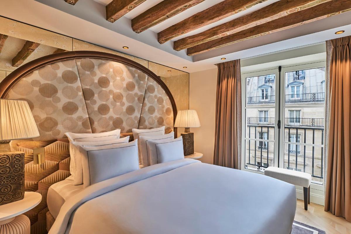 Un ou plusieurs lits dans un hébergement de l'établissement Maison Barrière Vendôme