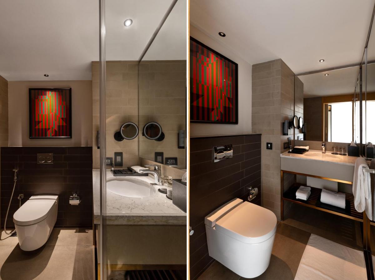 two pictures of a bathroom with a toilet and a sink at Parallel Hotel Udaipur, a member of Radisson Individuals in Udaipur