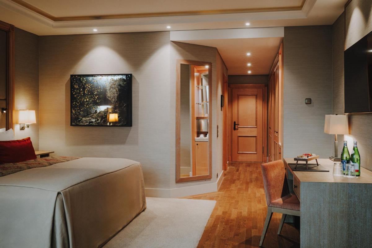 Ein Bett oder Betten in einem Zimmer der Unterkunft Althoff Seehotel Überfahrt