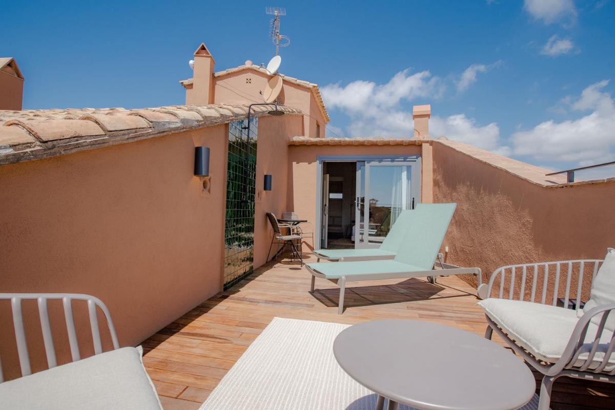 Un balcón o terraza de Gran Claustre Boutique Hotel