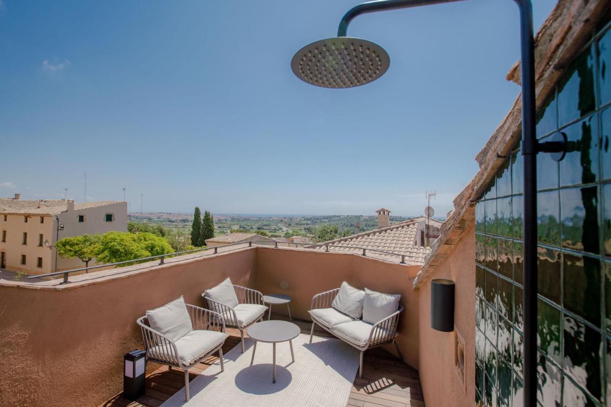 Un balcón o terraza de Gran Claustre Boutique Hotel
