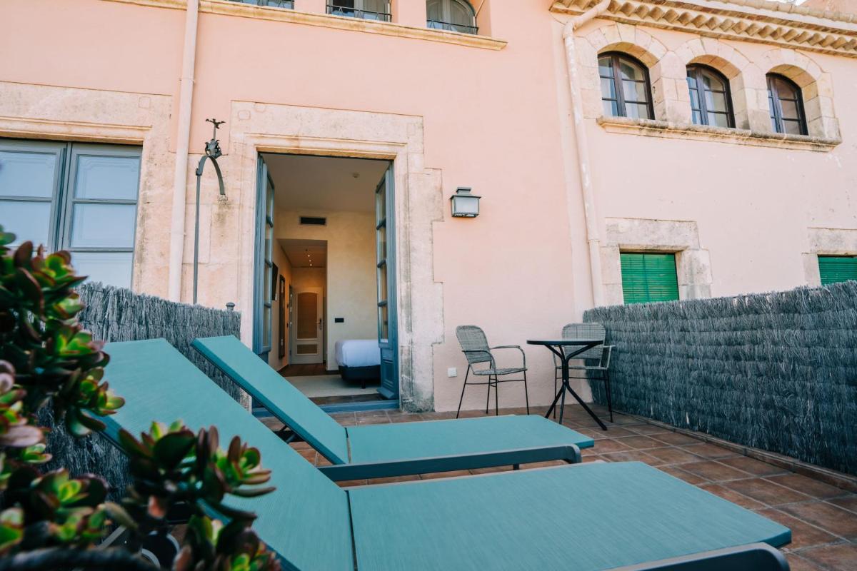 Un balcón o terraza de Gran Claustre Boutique Hotel