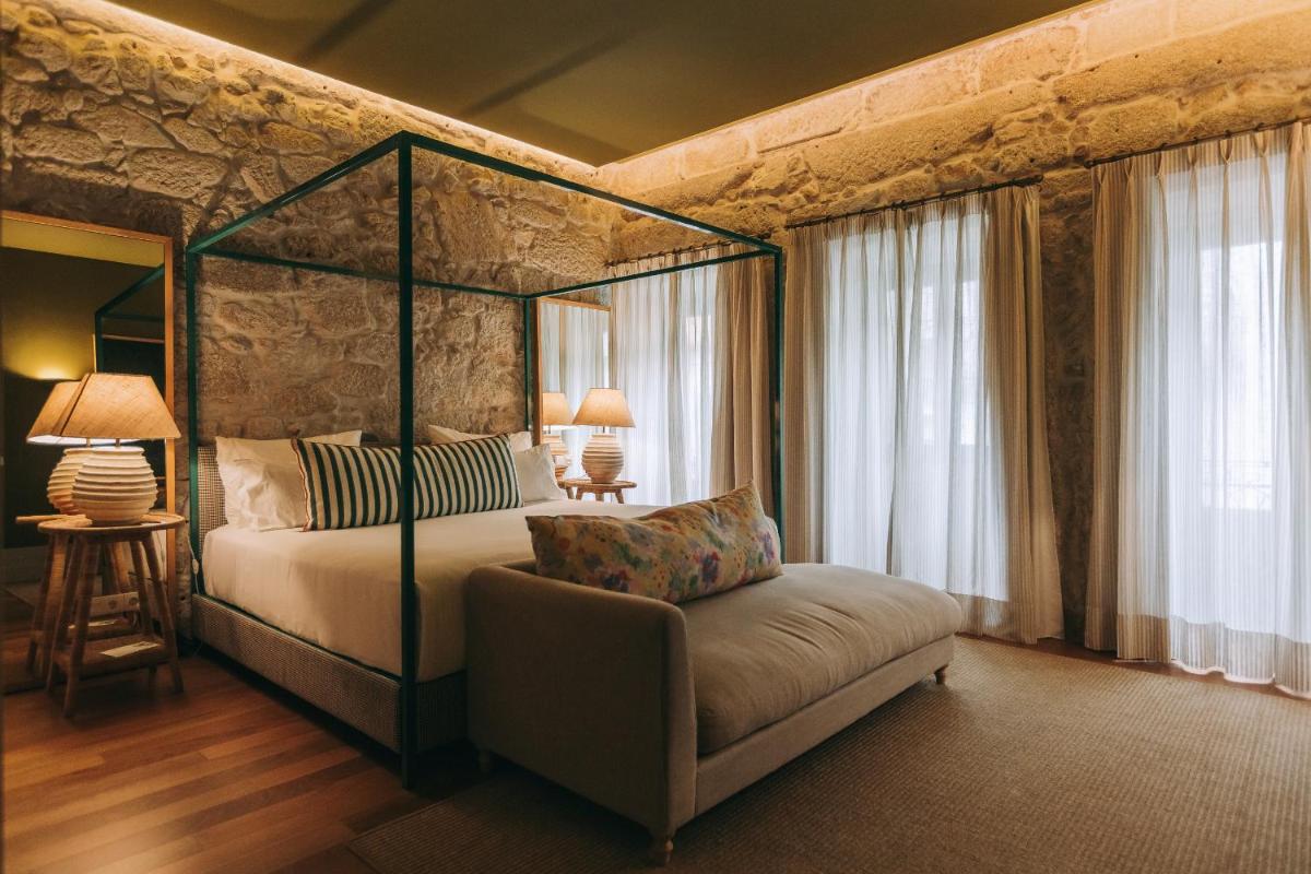 Uma cama ou camas num quarto em Torel Saboaria