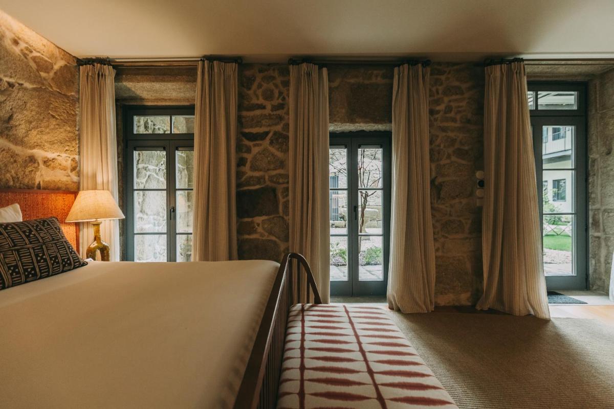 Uma cama ou camas num quarto em Torel Saboaria