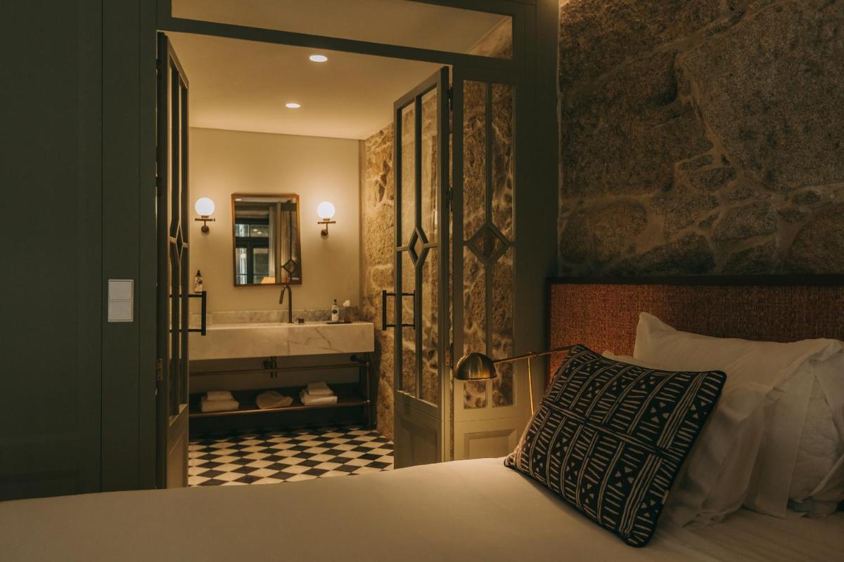 Uma cama ou camas num quarto em Torel Saboaria