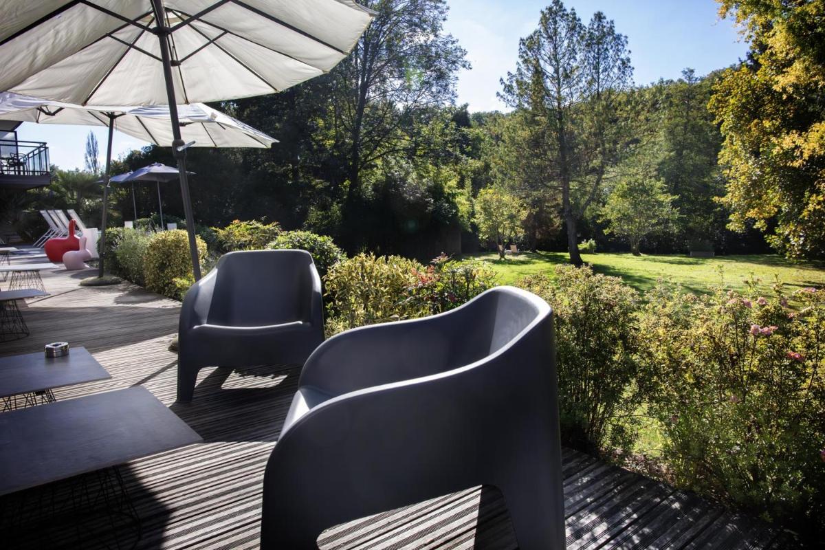 Jardin de l'établissement L'Aubinière Hôtel Restaurant & Spa
