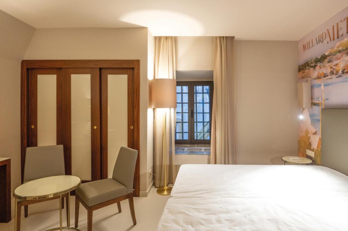 Uma cama ou camas num quarto em Vila Gale Collection Elvas