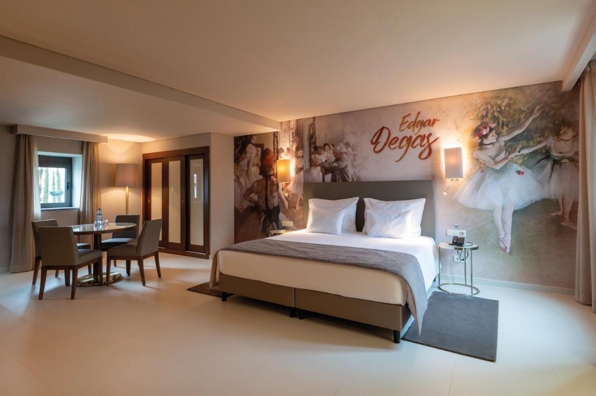 Uma cama ou camas num quarto em Vila Gale Collection Elvas